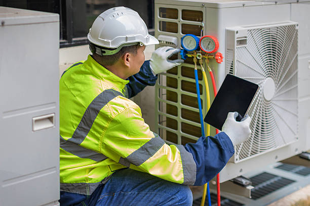 Professional Hvac technician working in Fletcher, OH